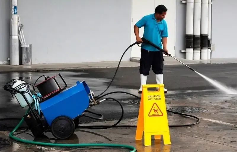 Clean commercial facility environment promoting health and safety after pressure washing